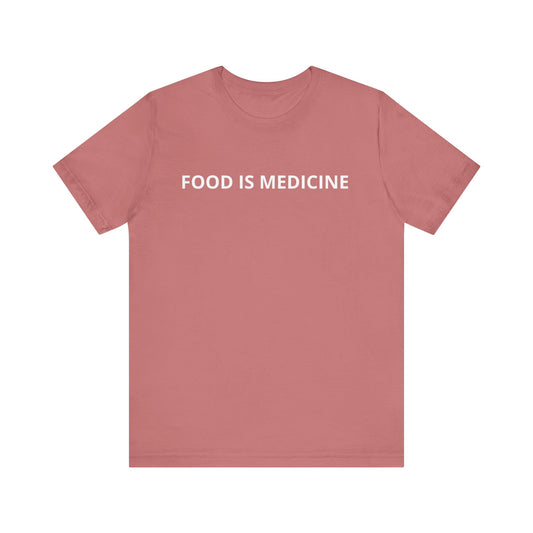 Mauve t-shirt with 'FOOD IS MEDICINE' text on a white background