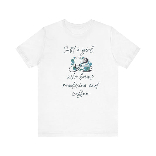 White t-shirt with text 'Just a girl who loves medicine and coffee' on a white background